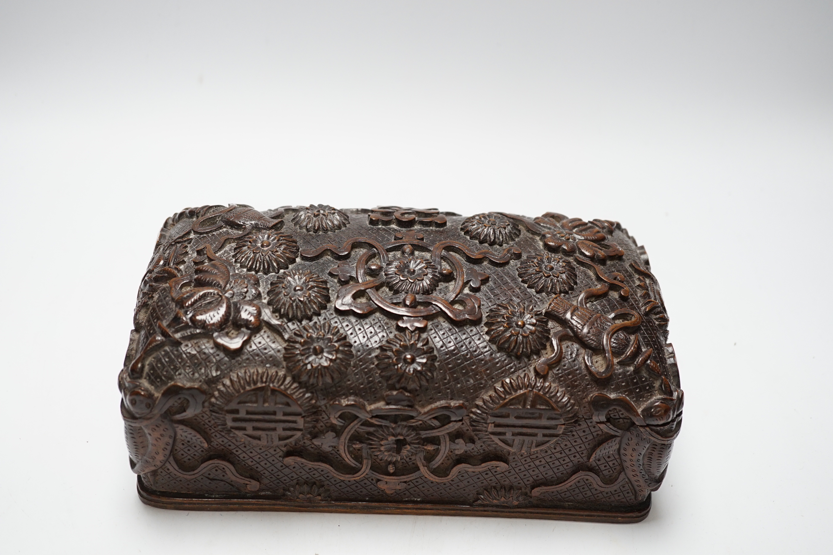 A Burmese carved teak box, early 20th century, 25cm wide x 13cm deep